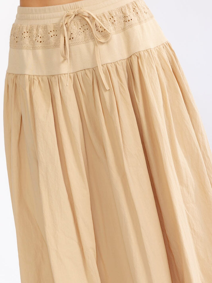 WOMEN'S ELASTIC WAIST FRONT POCKETS EYELET FIT & FLARE MAXI SKIRT