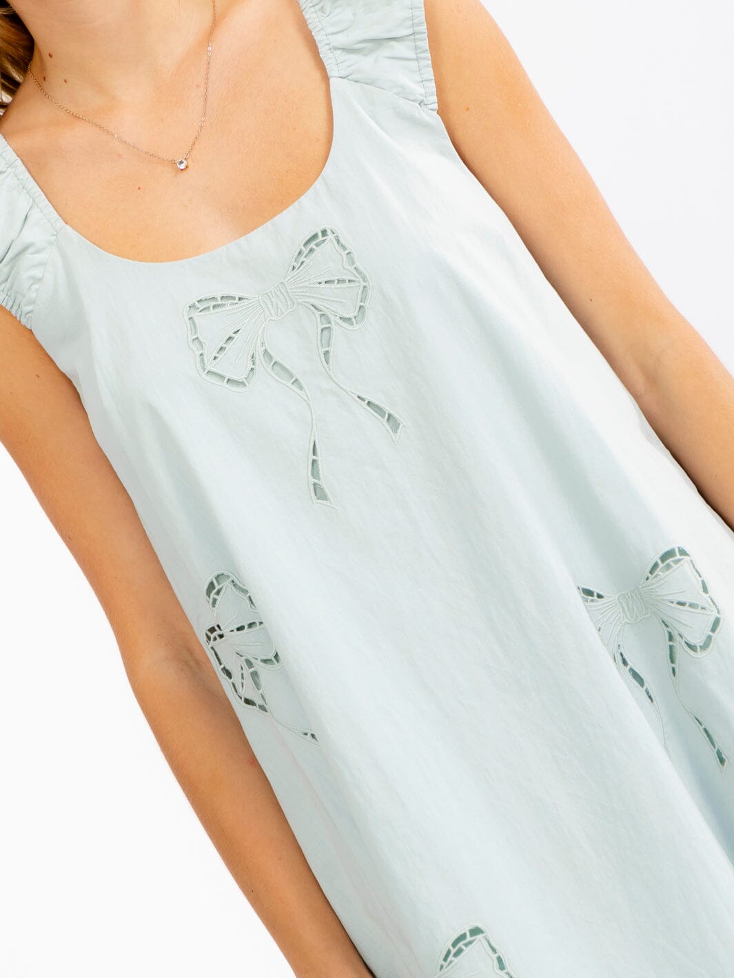 WOMEN'S SLEEVELESS EYELET BOWS TUNIC MINI DRESS