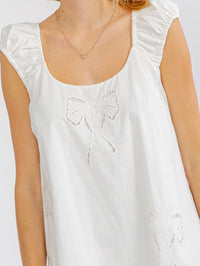 WOMEN'S SLEEVELESS EYELET BOWS TUNIC MINI DRESS