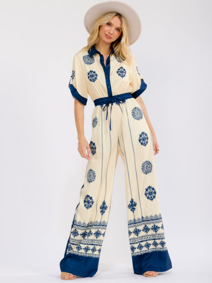 WOMEN'S SHORT SLEEVE ELASTIC WAIST FRONT POCKETS BUTTON UP WIDE LEG MULTI PRINT JUMPSUIT