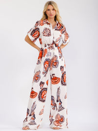 WOMEN'S SHORT SLEEVE BUTTON UP ELASTIC WAIST POCKETS WIDE LEG MULTI PRINT JUMPSUIT