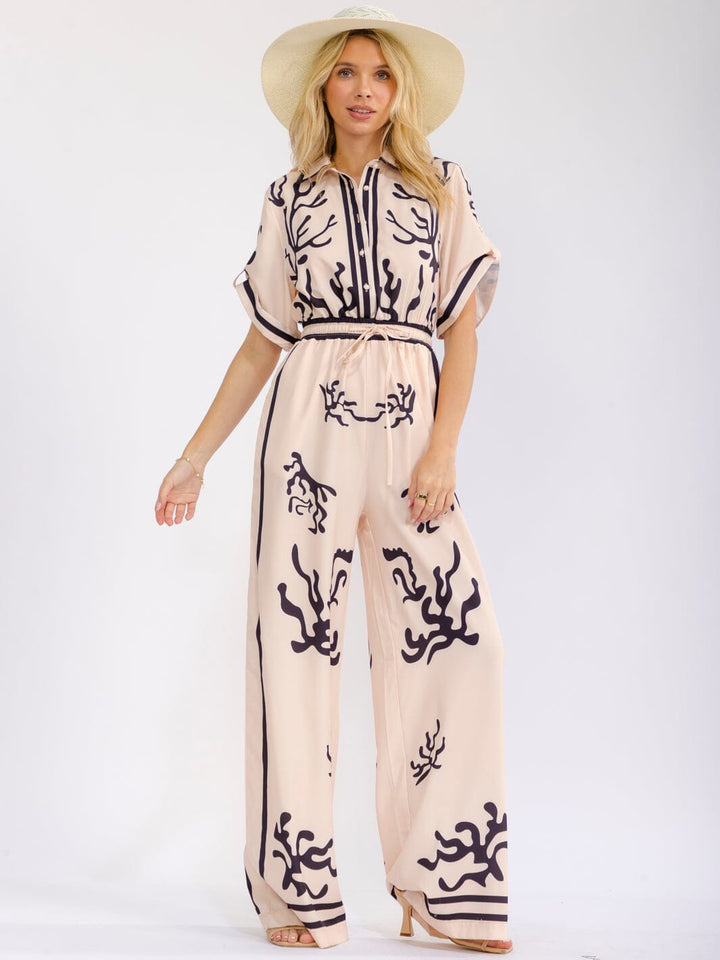WOMEN'S SHORT SLEEVE BUTTON UP ELASTIC WAIST POCKETS WIDE LEG MULTI PRINT JUMPSUIT