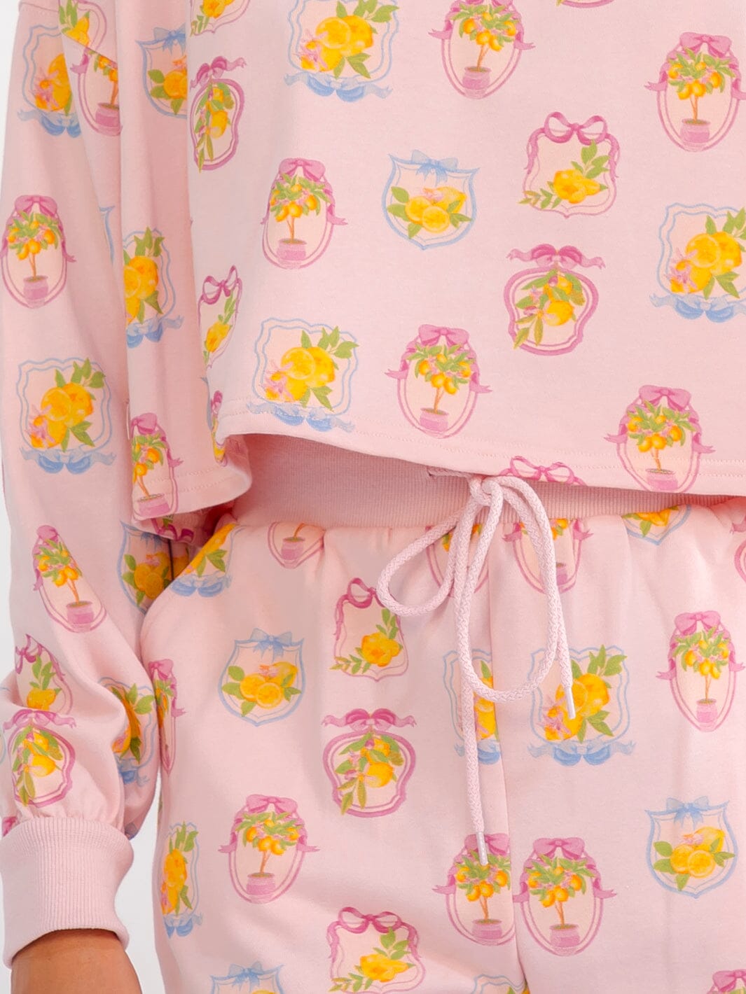 WOMEN'S ELASTIC WAIST FRONT POCKETS SELF TIE MULTI PRINT MINI SHORTS