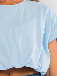 WOMEN'S SHORT SLEEVE BUBBLE HEM PEARL DETAILED TOP