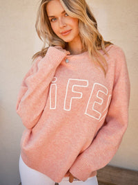 WOMEN'S LONG SLEEVE GRAPHIC PULLOVER SWEATER