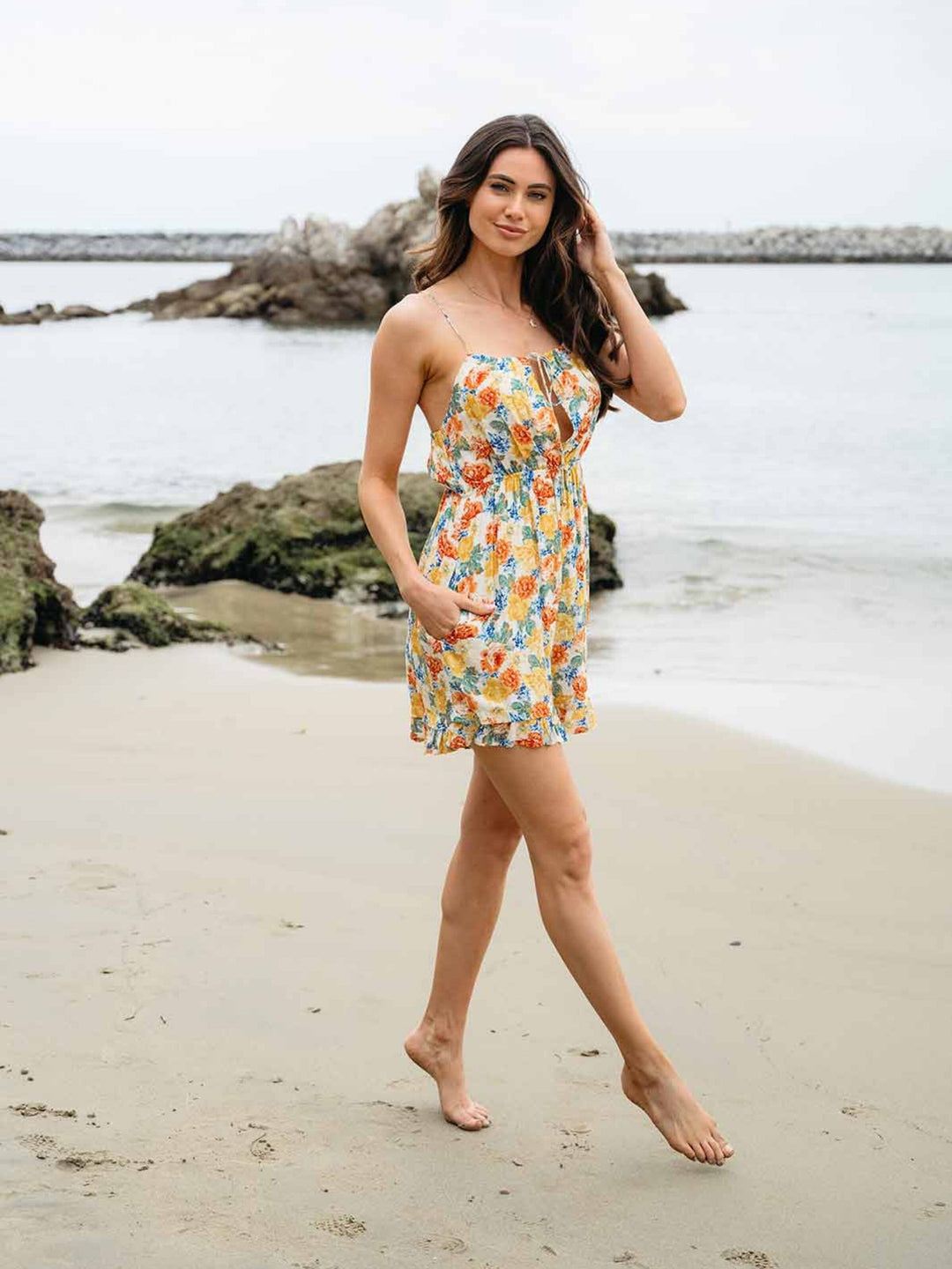 WOMEN'S SLEEVELESS V-NECK CUT OUT POCKETS FLORAL ROMPER