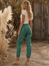 WOMEN'S ELASTIC WAIST FRONT POCKETS JOGGER LEGS PU PLEATHER PANTS