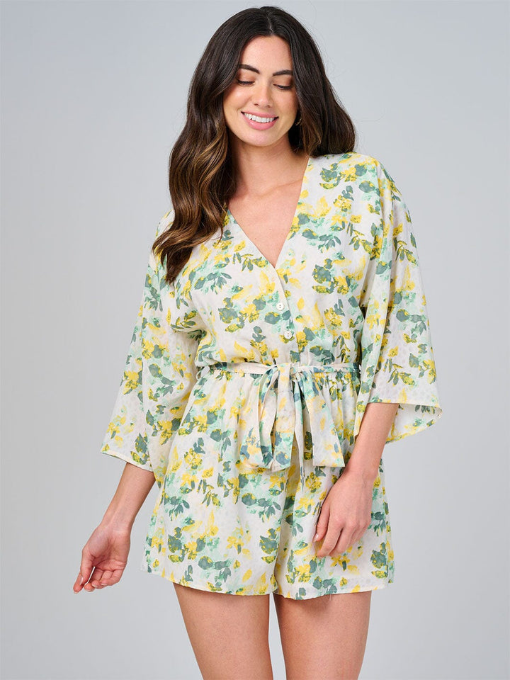 WOMEN'S SHORT SLEEVE BUTTON UP ELASTIC WAIST FRONT POCKETS FLORAL ROMPER