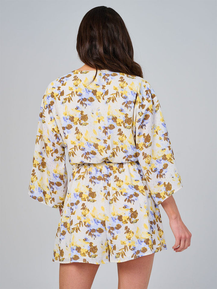 WOMEN'S SHORT SLEEVE BUTTON UP ELASTIC WAIST FRONT POCKETS FLORAL ROMPER