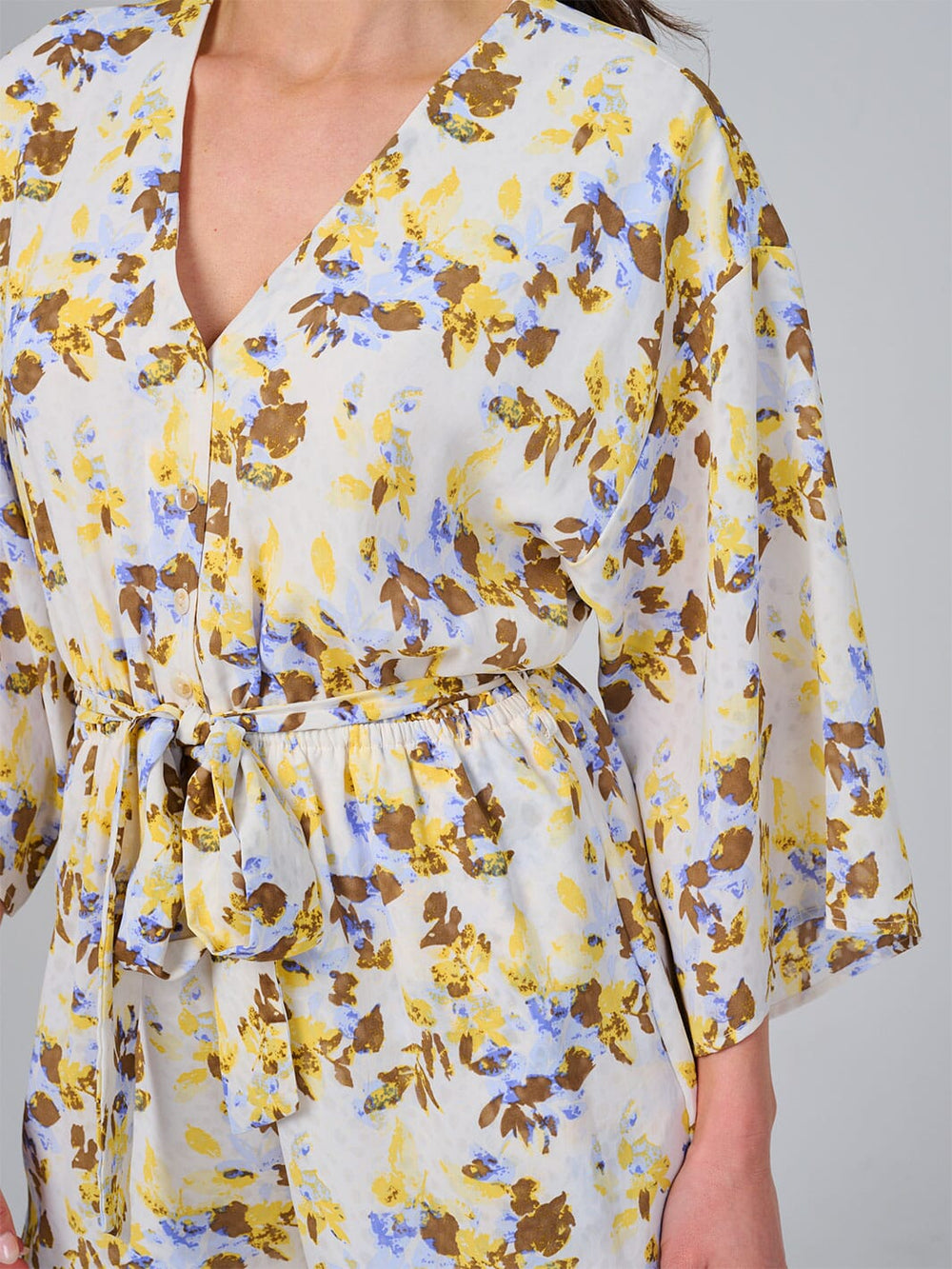 WOMEN'S SHORT SLEEVE BUTTON UP ELASTIC WAIST FRONT POCKETS FLORAL ROMPER