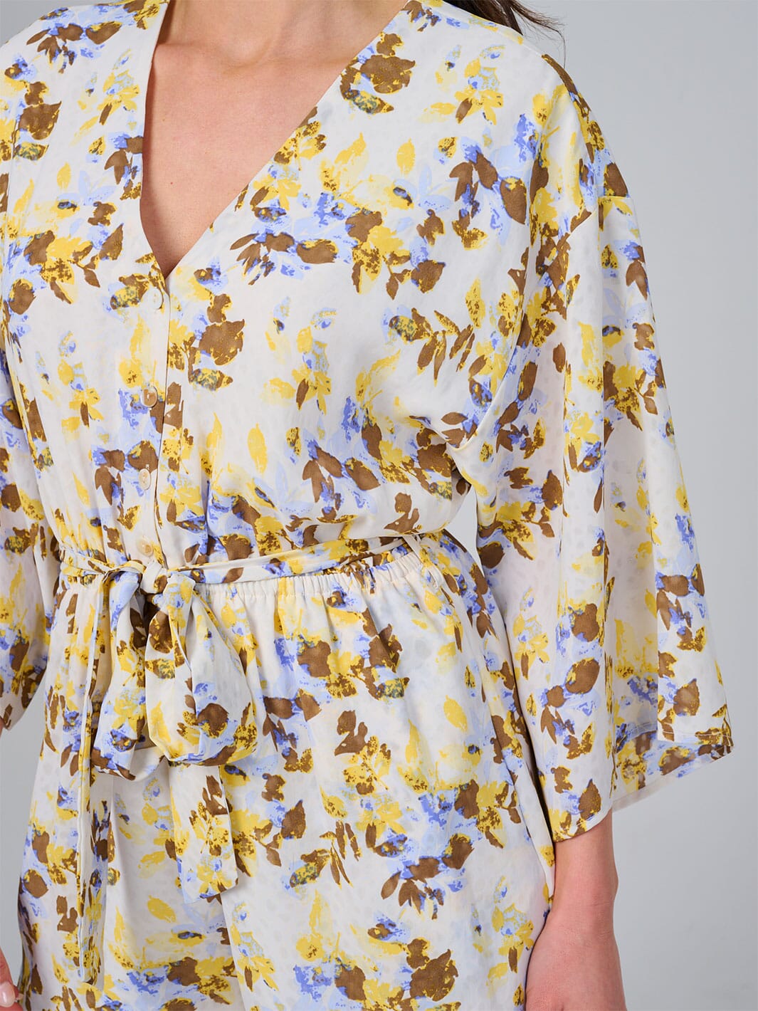 WOMEN'S SHORT SLEEVE BUTTON UP ELASTIC WAIST FRONT POCKETS FLORAL ROMPER