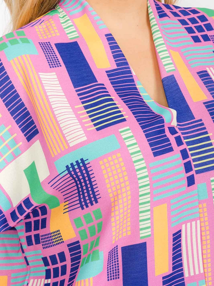 PLUS SIZE SHORT SLEEVE V-NECK MULTI PRINT TUNIC BLOUSE