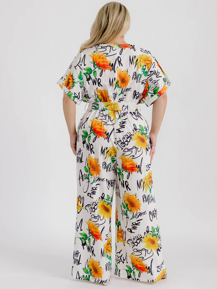 PLUS SIZE SHORT SLEEVE SURPLICE ELASTIC WAIST MULTI PRINT WIDE LEG JUMPSUIT
