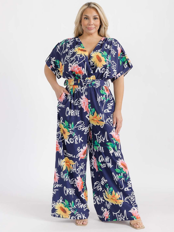 PLUS SIZE SHORT SLEEVE SURPLICE ELASTIC WAIST MULTI PRINT WIDE LEG JUMPSUIT