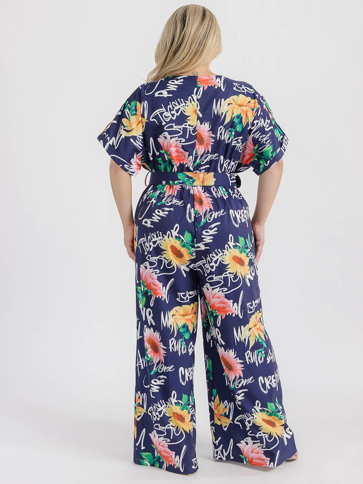 PLUS SIZE SHORT SLEEVE SURPLICE ELASTIC WAIST MULTI PRINT WIDE LEG JUMPSUIT