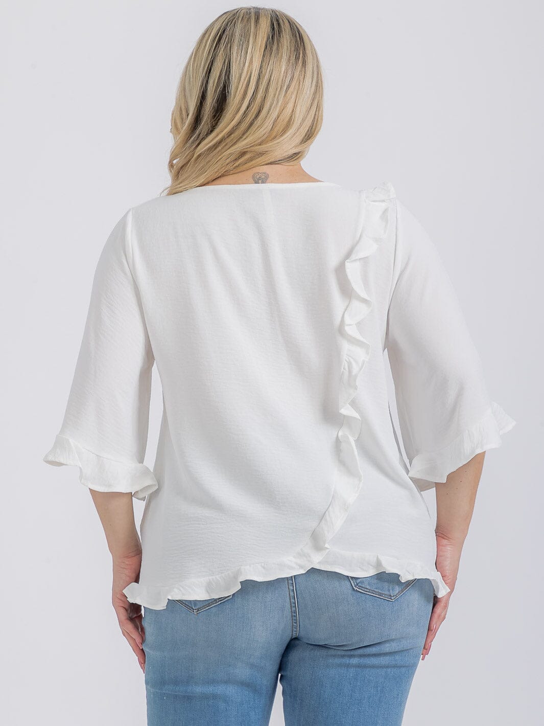 PLUS SIZE SHORT SLEEVE BACK RUFFLE TUNIC BLOUSE