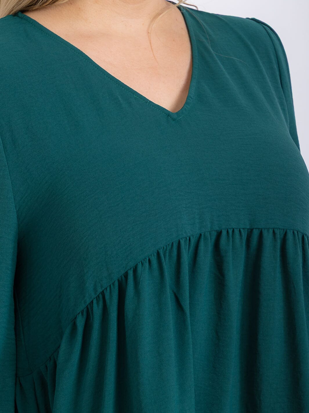PLUS SIZE LONG SLEEVE V-NECK RUFFLE HIGH-LOW BLOUSE