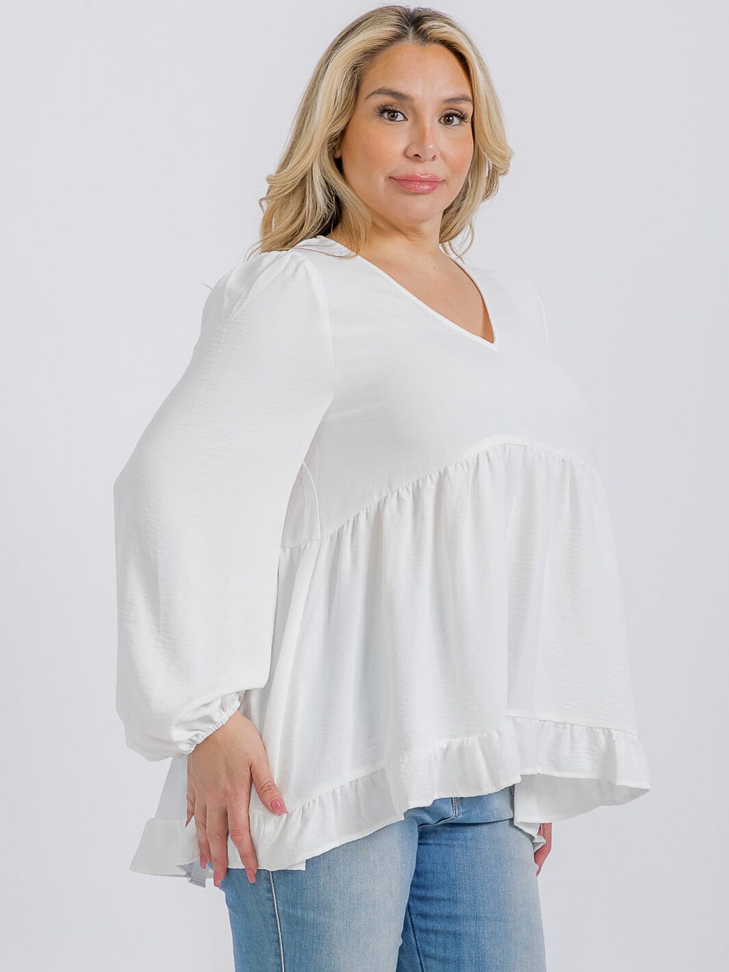 PLUS SIZE LONG SLEEVE V-NECK RUFFLE HIGH-LOW BLOUSE