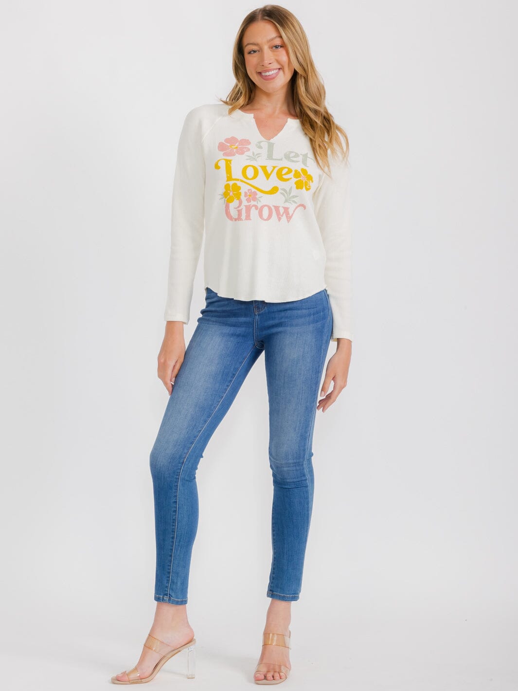 WOMEN'S LONG SLEEVE V-NECK GRAPHIC TOP