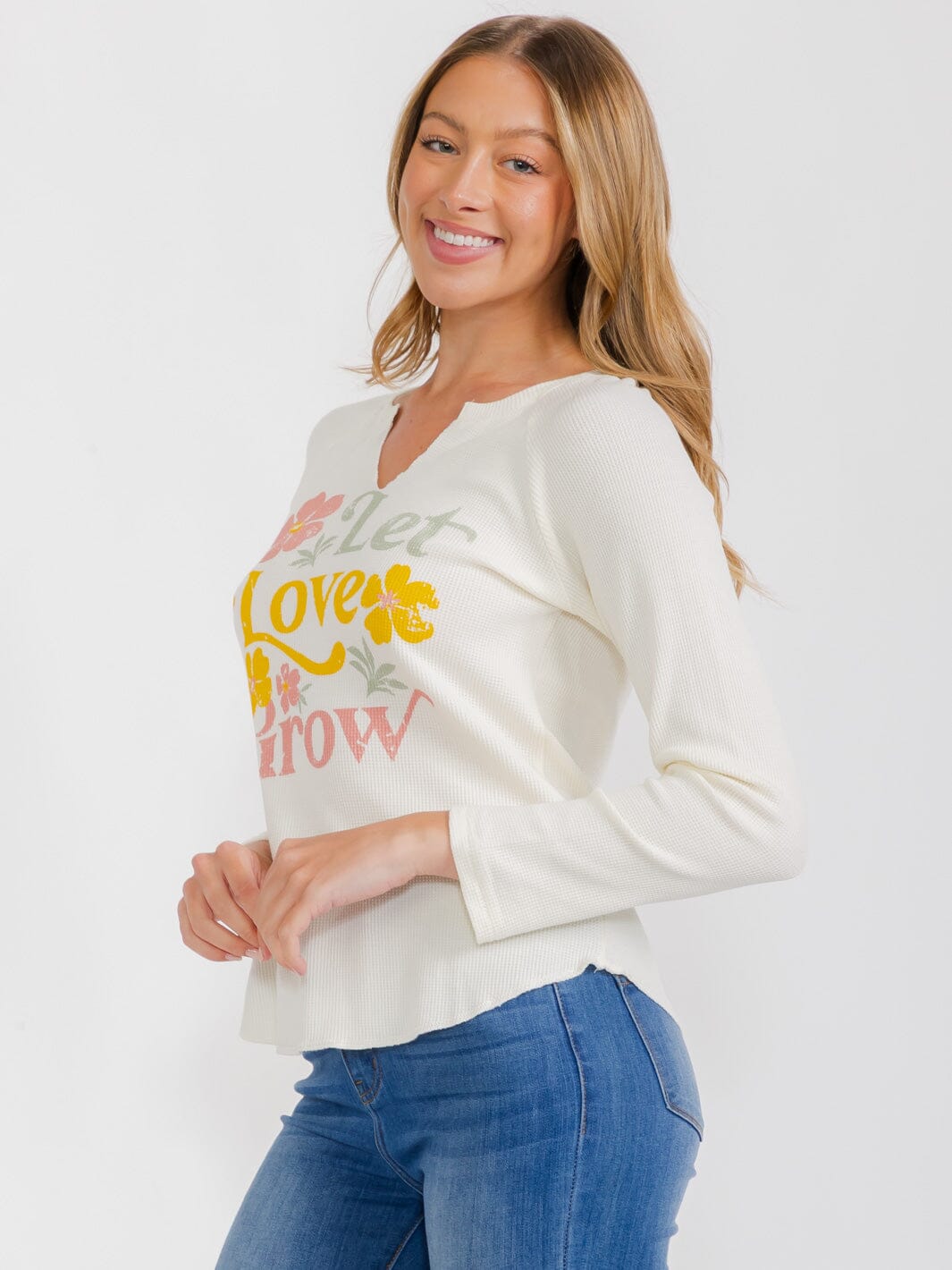 WOMEN'S LONG SLEEVE V-NECK GRAPHIC TOP