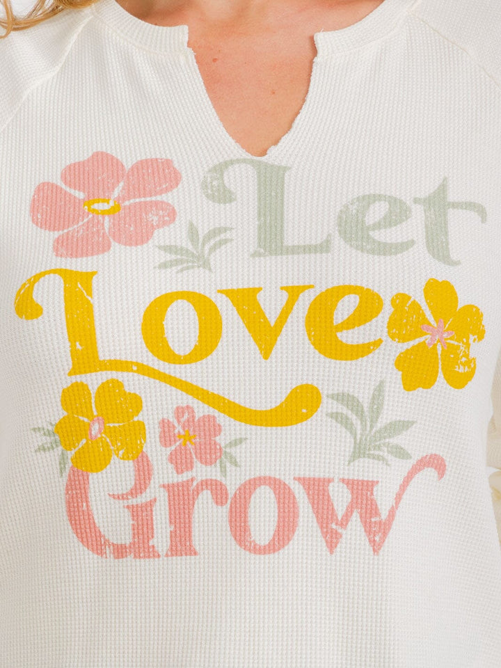 WOMEN'S LONG SLEEVE V-NECK GRAPHIC TOP