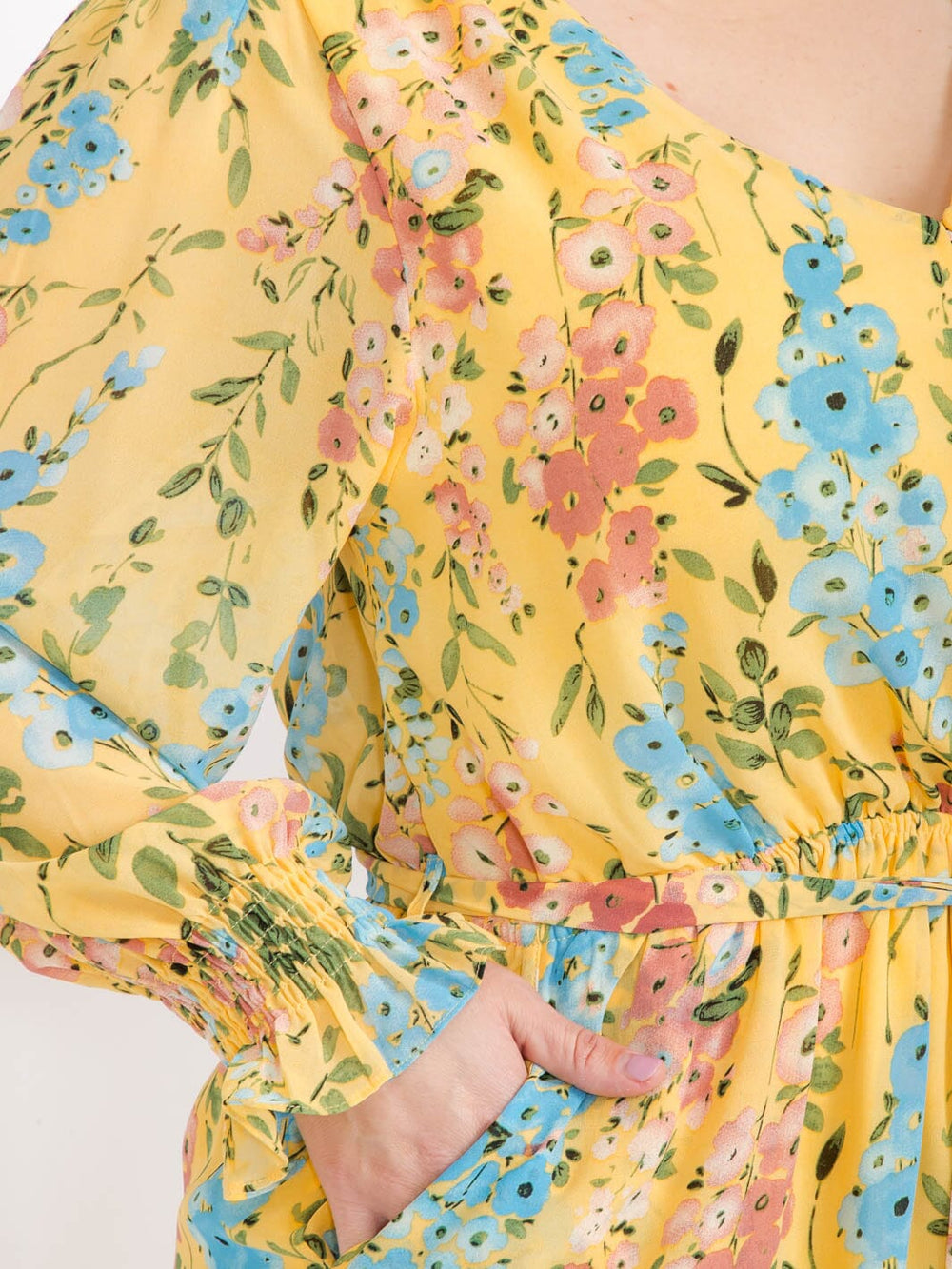 PLUS SIZE LONG SLEEVE BUTTON UP FRONT POCKETS SELF TIE FLORAL ROMPER