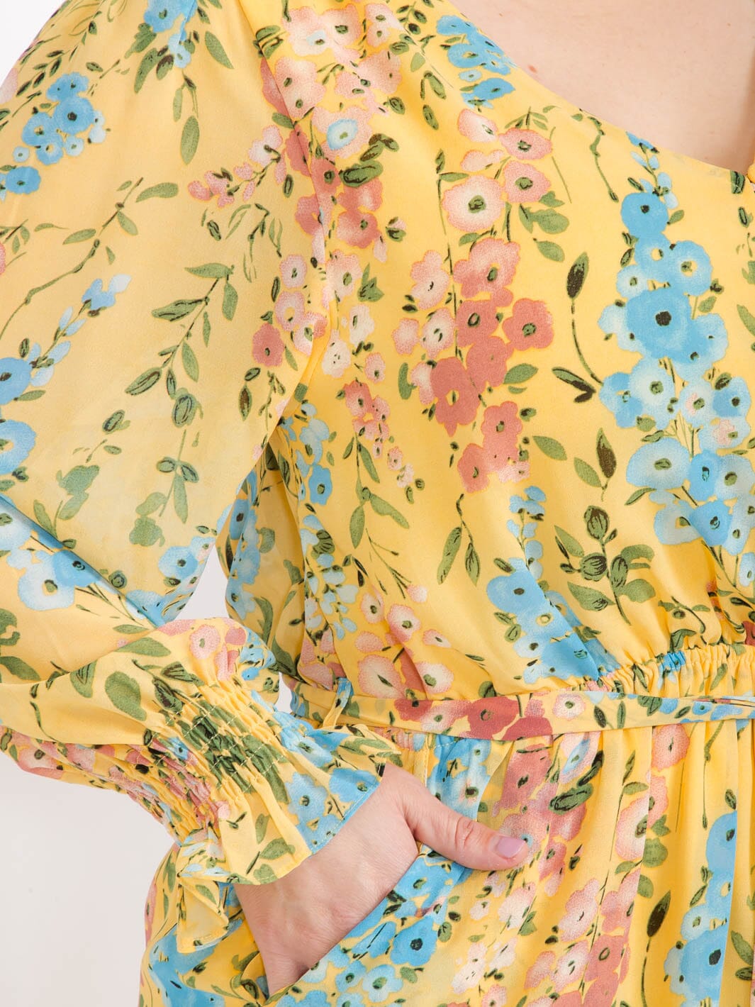 PLUS SIZE LONG SLEEVE BUTTON UP FRONT POCKETS SELF TIE FLORAL ROMPER