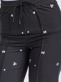 WOMEN'S ELASTIC WAIST SELF TIE STUDS DETAILED WIDE LEG PANTS