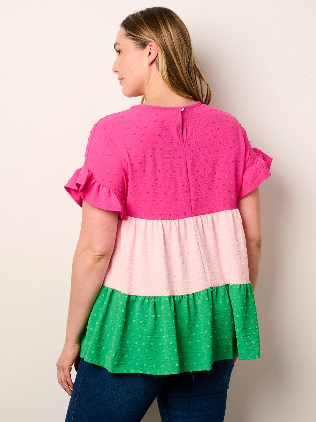 PLUS SHORT SLEEVE TIERED COLORBLOCK TUNIC SWISS TOP