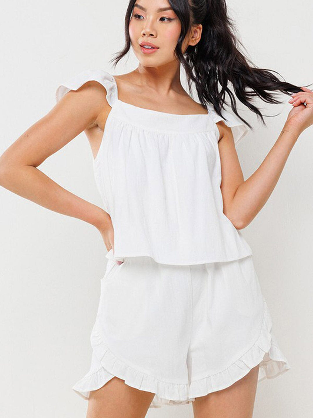 WOMEN'S SLEEVELESS FRONT POCKETS RUFFLE ROMPER