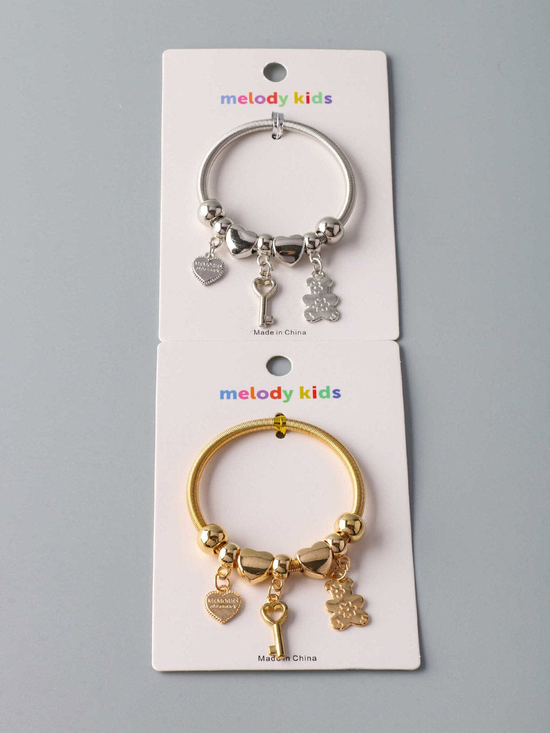 WOMEN'S GOLD & SILVER ASSORTED CHARMS BRACELET