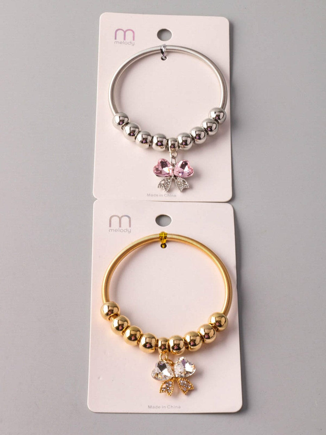 WOMEN'S FASHION GOLD & SILVER BOWS BRACELET