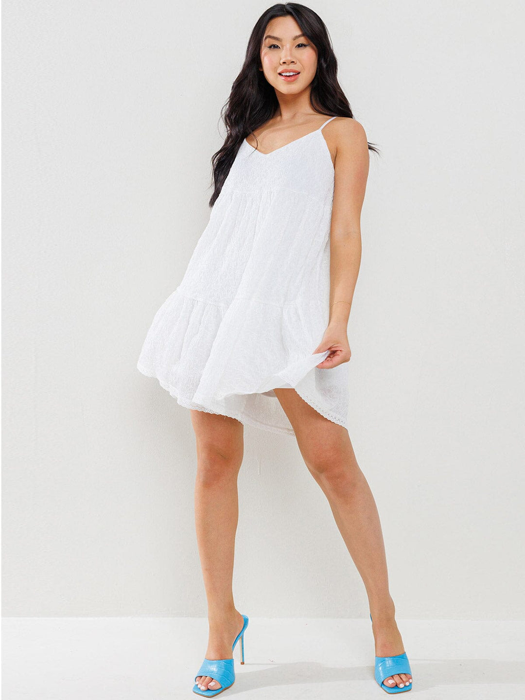 WOMEN'S SLEEVELESS RUFFLE TIERED TUNIC ROMPER – Wholesalefashiontrends.com
