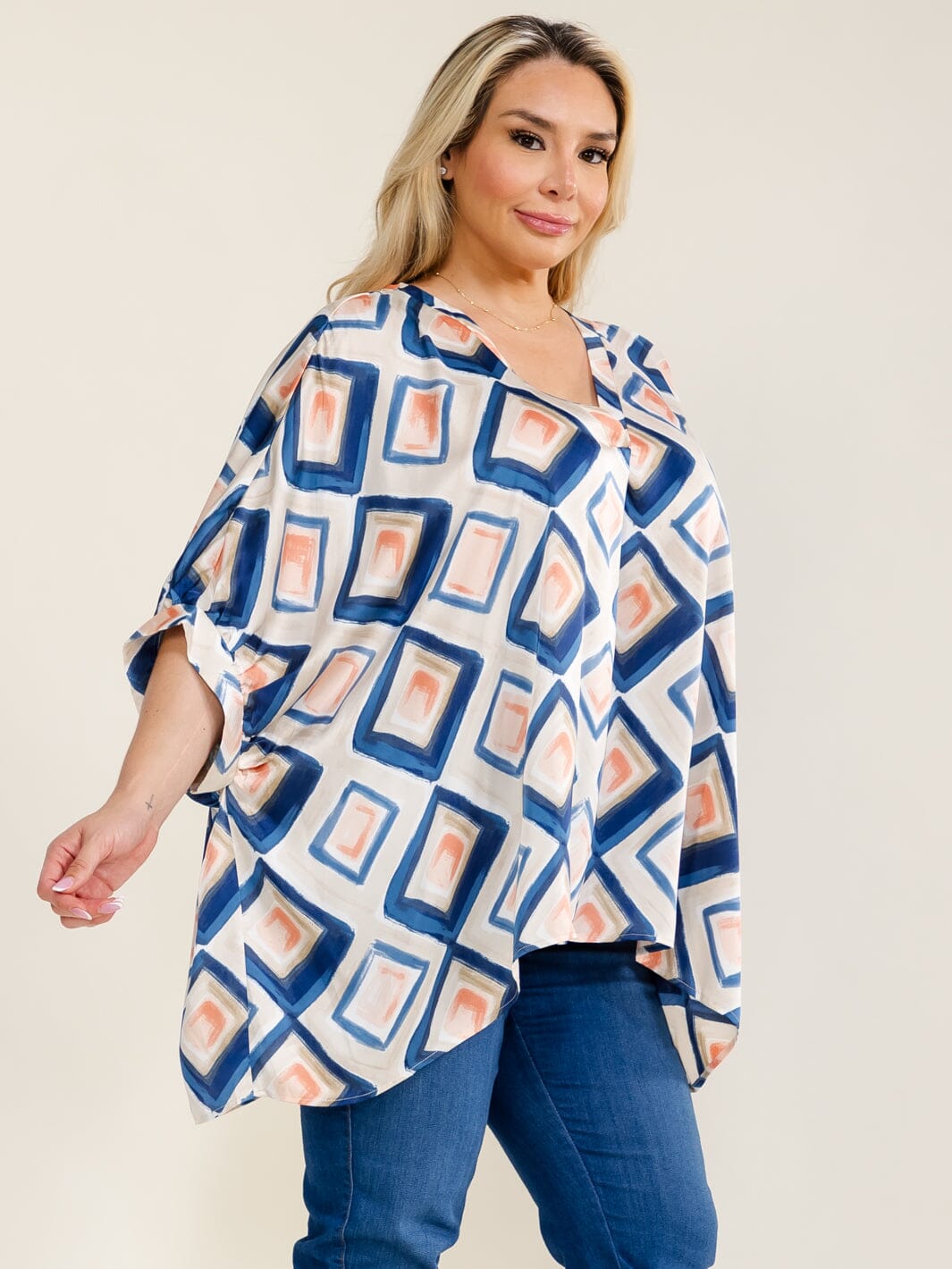 PLUS SIZE SHORT SLEEVE V-NECK MULTI PRINT TUNIC BLOUSE