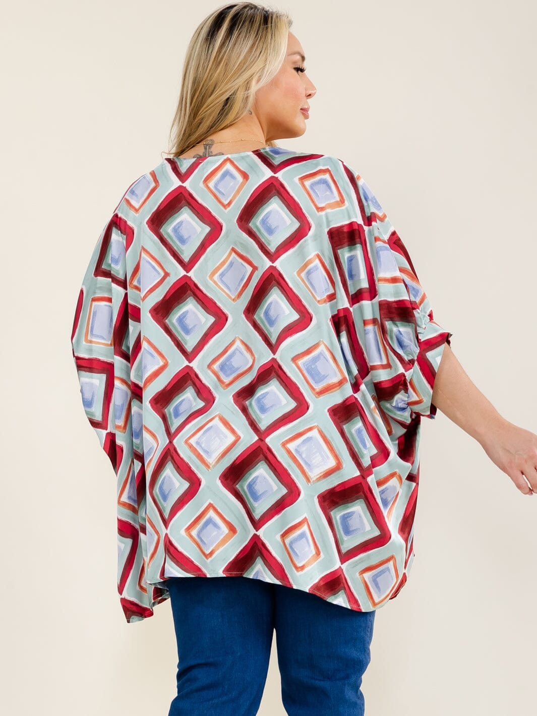 PLUS SIZE SHORT SLEEVE V-NECK MULTI PRINT TUNIC BLOUSE