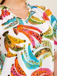 ENTRO PLUS SIZE SHORT SLEEVE V-NECK MULTI PRINT HIGH-LOW BLOUSE