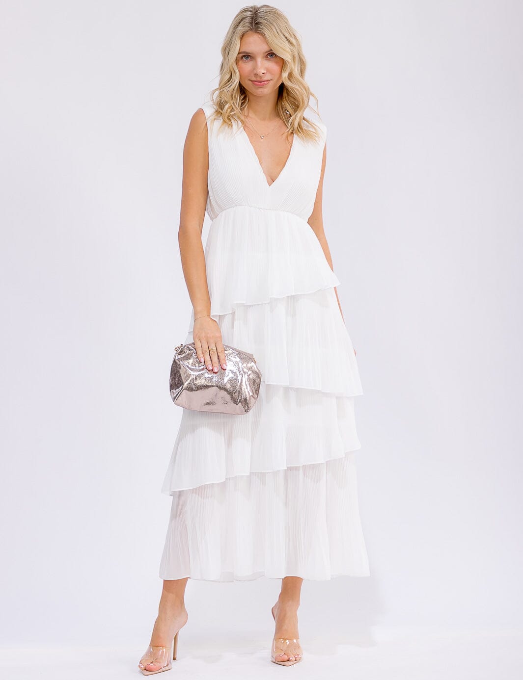 WOMEN'S SLEEVELESS V-NECK RUFFLE TIERED MAXI DRESS Wholesalefashiontrends.com WOMEN'S SLEEVELESS V-NECK RUFFLE TIERED MAXI DRESS Wholesalefashiontrends.com