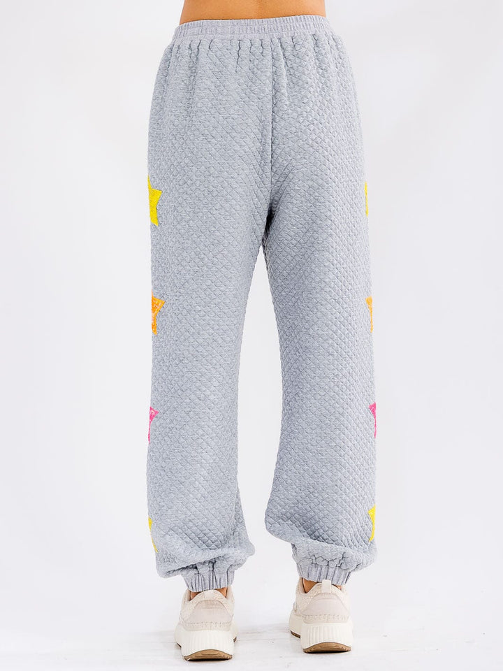 WOMEN'S ELASTIC WAIST FRONT POCKET SEQUINS STARS DETAILED SWEATPANTS