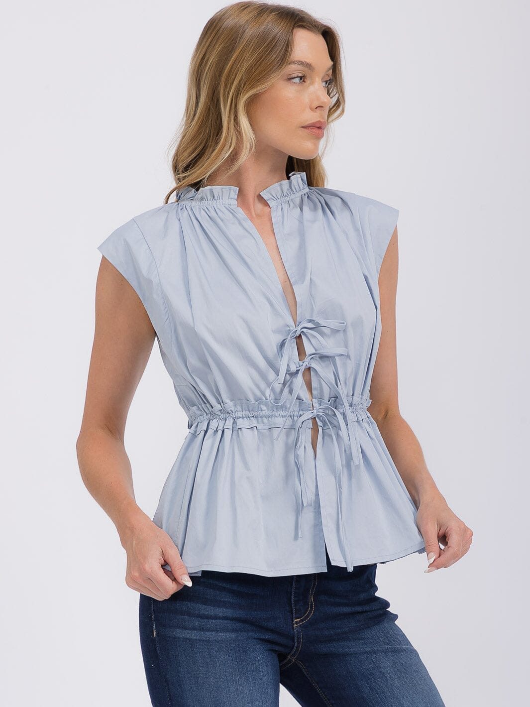 WOMEN'S SLEEVELESS FRONT TIE PEPLUM TOP