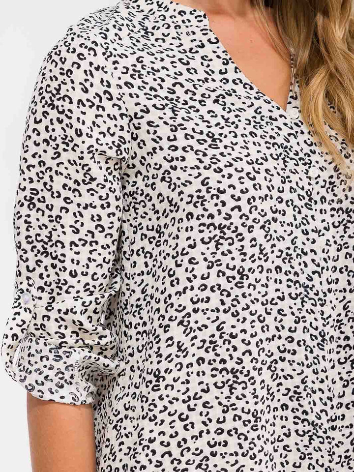 WOMEN'S LONG SLEEVE BUTTON UP FRONT POCKET HIGH-LOW ANIMAL PRINT MIDI DRESS