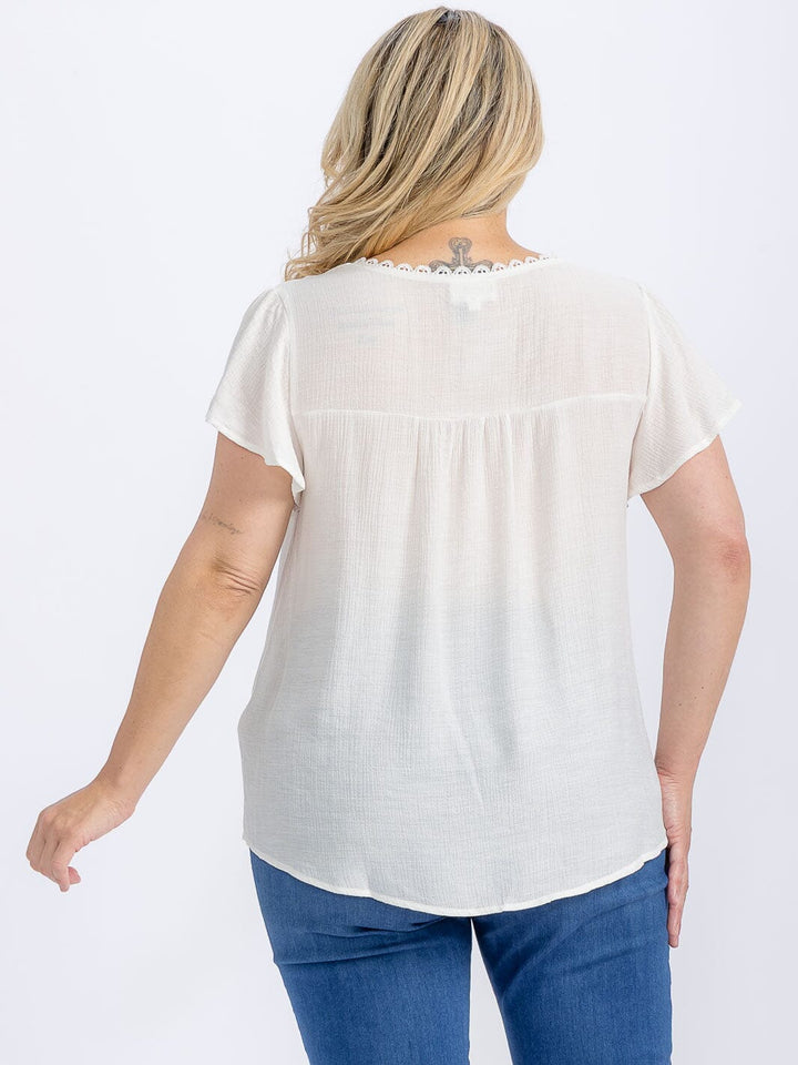 PLUS SIZE SHORT SLEEVE V-NECK HIGH-LOW CROCHET DETAILED BLOUSE