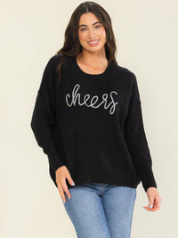 WOMEN'S LONG SLEEVE CHEERS PRINT PULLOVER SWEATER