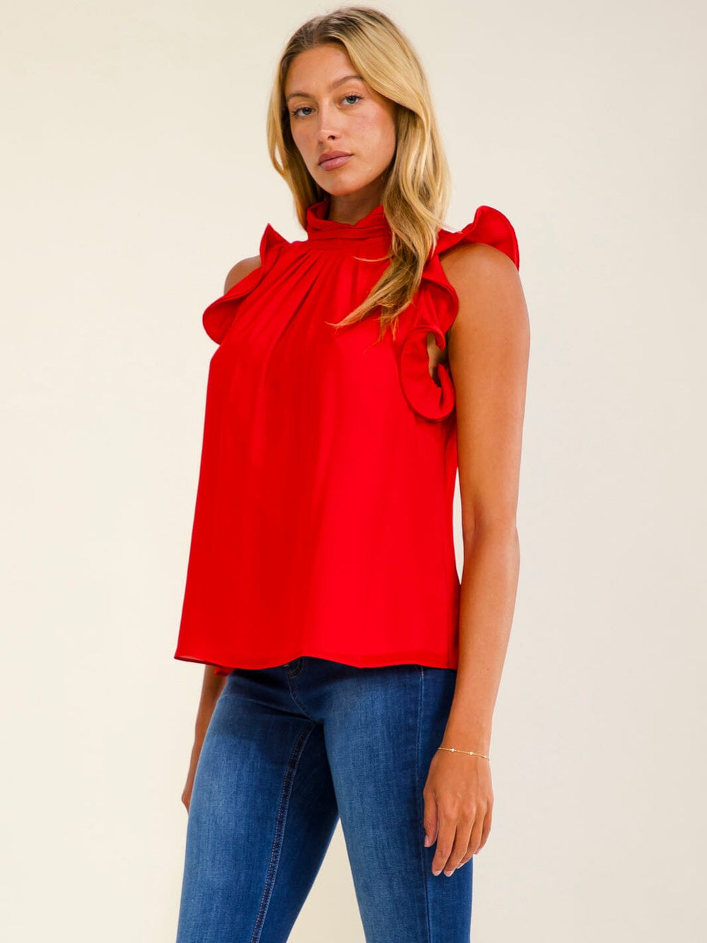 WOMEN'S RUFFLE SLEEVELESS MOCK NECK BLOUSE