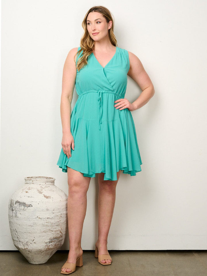 PLUS SIZE SLEEVELESS SURPLICE FIT & FLARE MINI DRESS