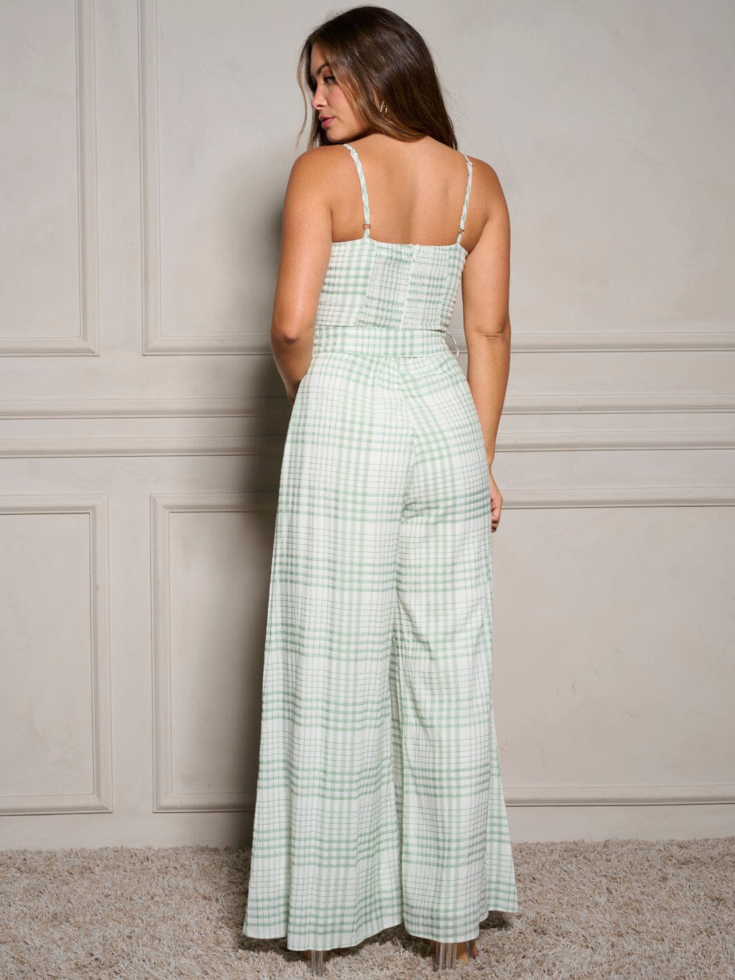 WOMEN'S SLEEVELESS BELTED PLAID WIDE LEG JUMPSUIT Wholesalefashiontrends.com WOMEN'S SLEEVELESS BELTED PLAID WIDE LEG JUMPSUIT Wholesalefashiontrends.com