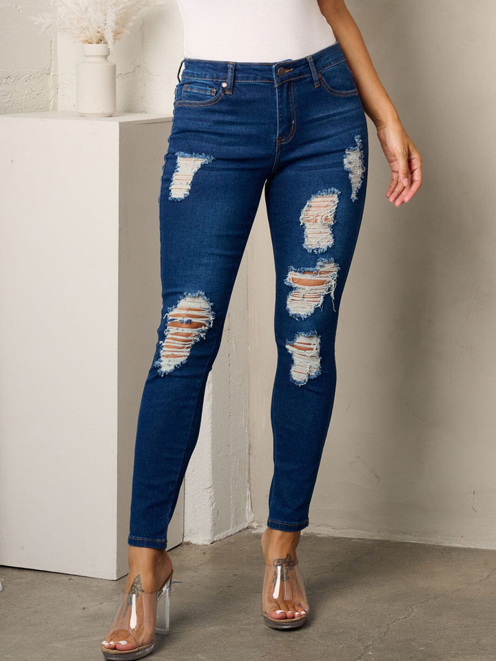 WOMEN'S BUTTON CLOSURE DISTRESSED SKINNY JEANS