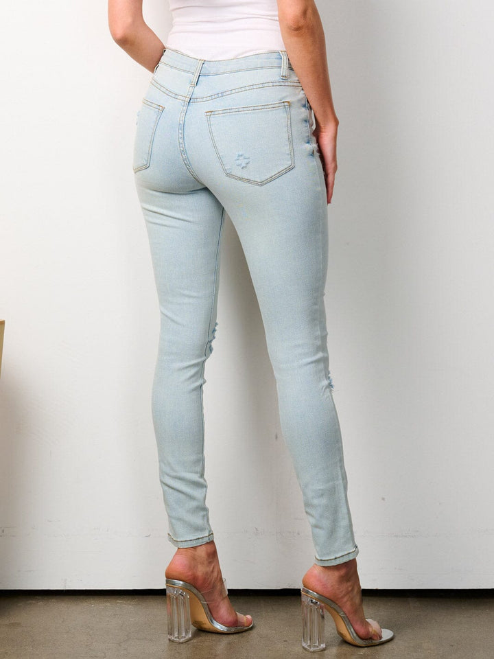 WOMEN'S BUTTON CLOSURE DISTRESSED SKINNY DENIM PANTS