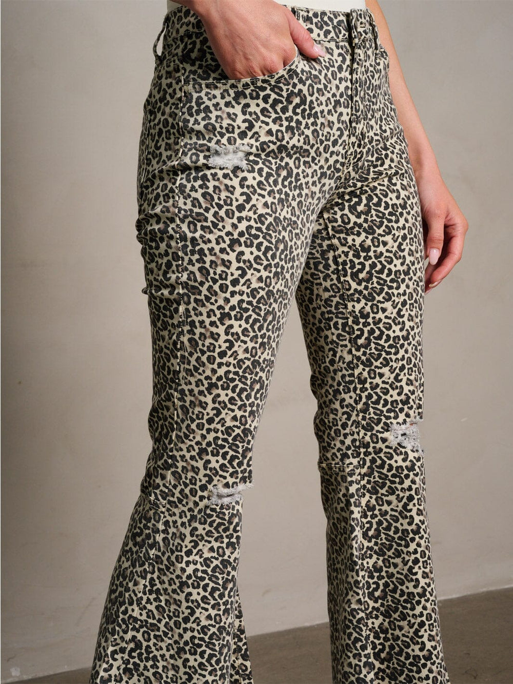 WOMEN'S BUTTON CLOSURE DISTRESSED LEOPARD PRINT BELL BOTTOMS DENIM PANTS