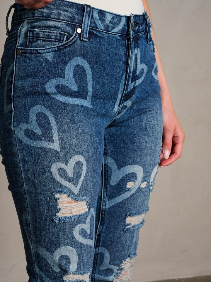 WOMEN'S BUTTON CLOSURE HEART PRINT DISTRESS DENIM SKINNY PANTS