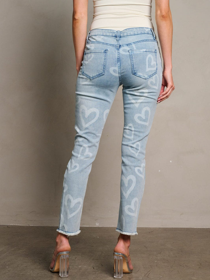 WOMEN'S BUTTON CLOSURE HEART PRINT DISTRESS DENIM SKINNY PANTS